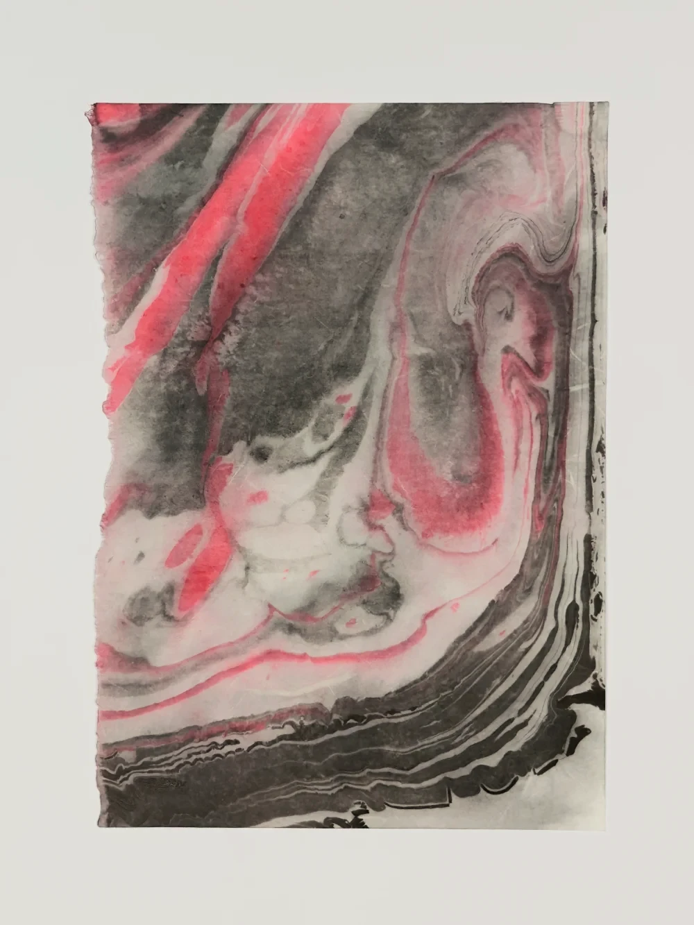 Paper marbling monotype with layered translucent rings and warm tones, right half