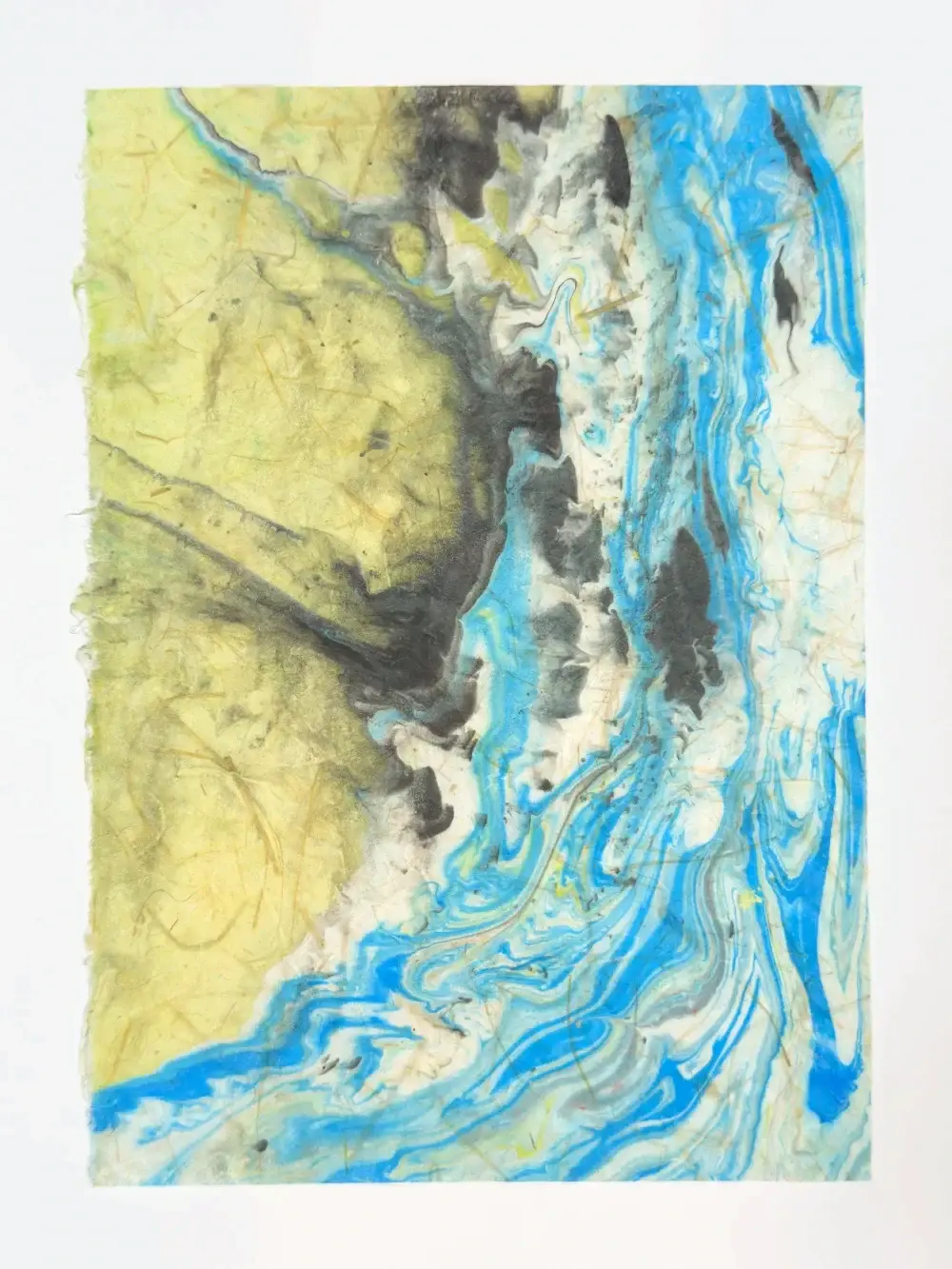 Blue swirling currents meeting a textured olive-yellow mass through a dark edge