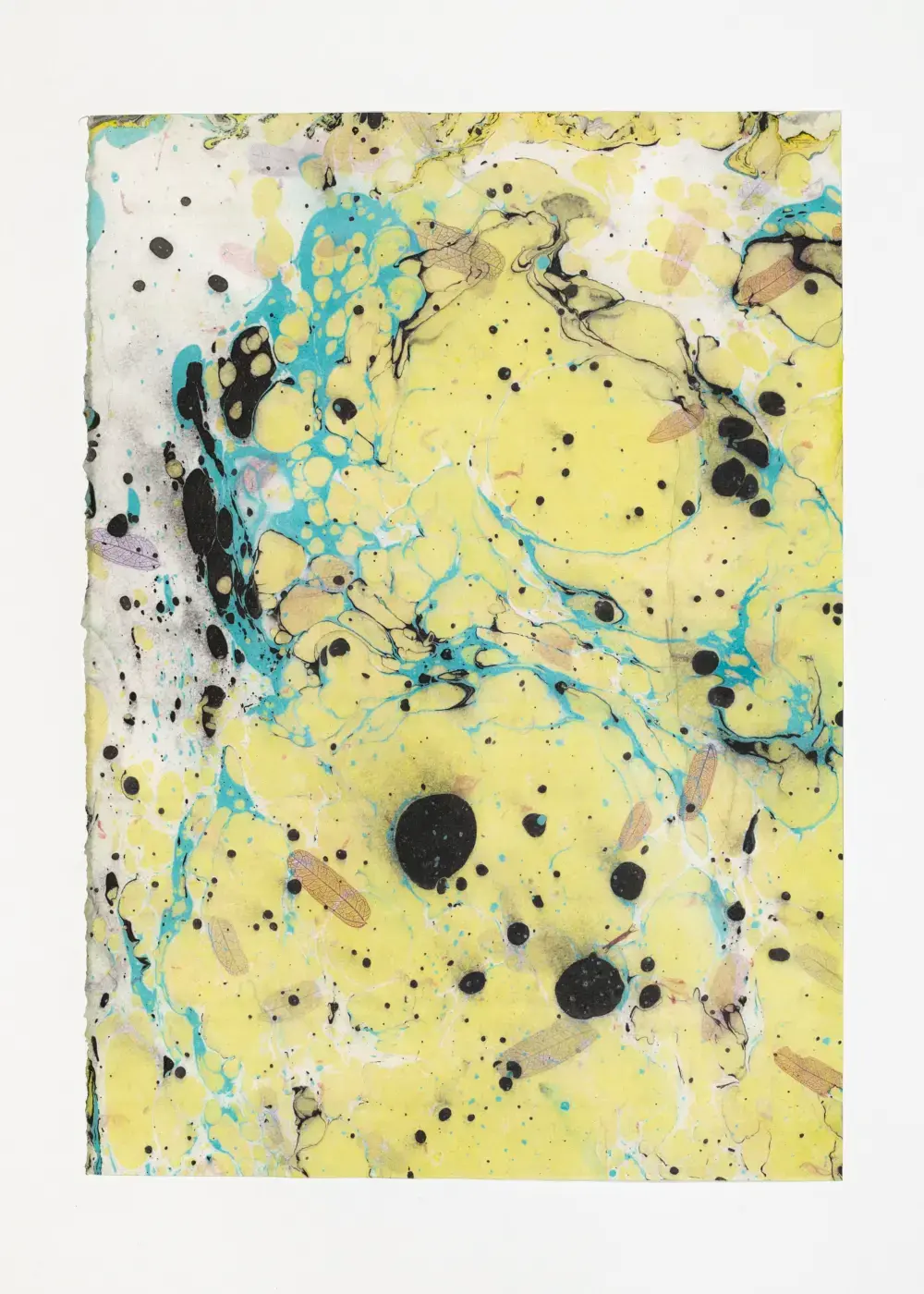 Lacy black and turquoise splatter scattered across yellow on textured washi with embedded fibers