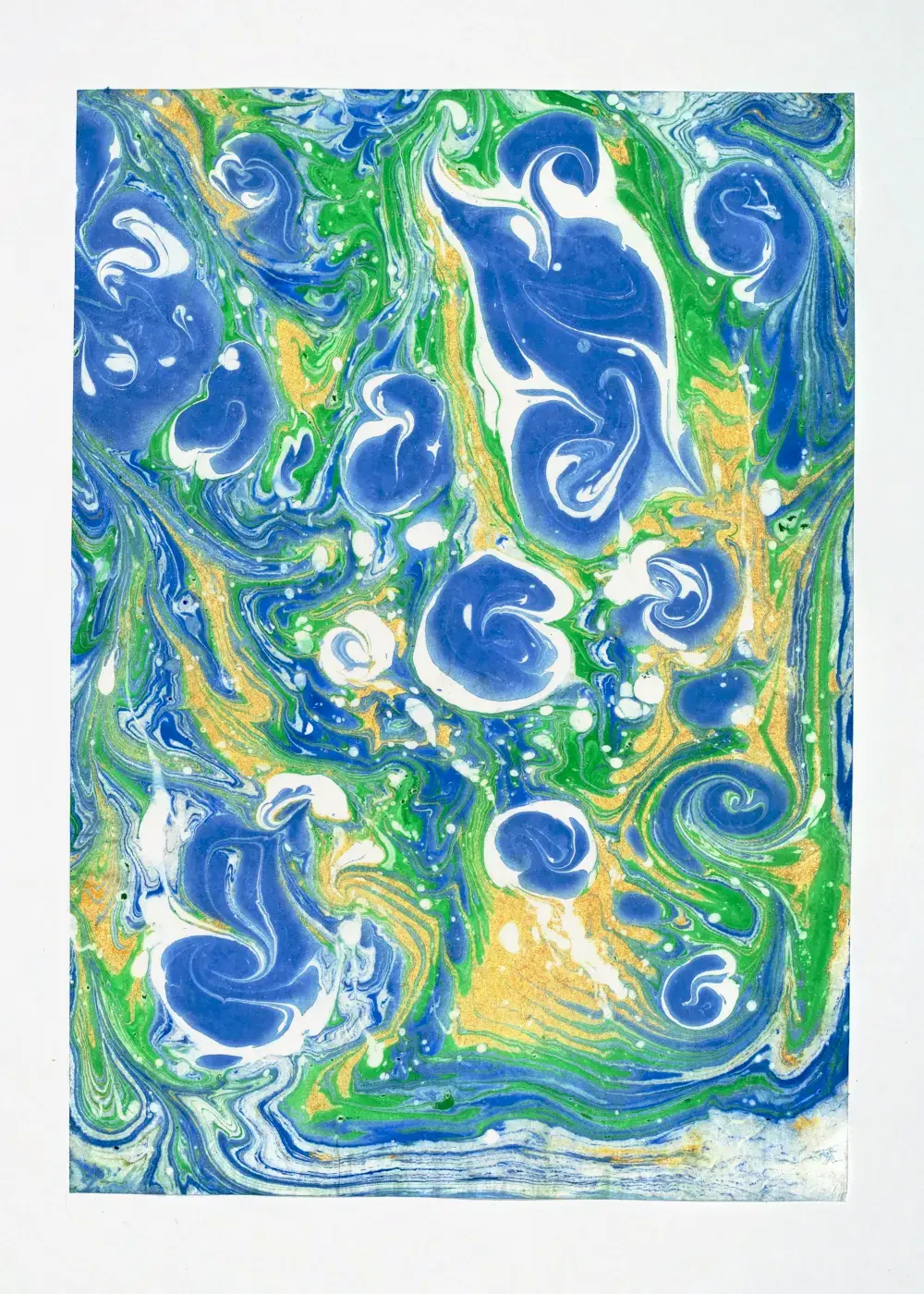 Blue and green ribbons swirling across a metallic gold ground, white-edged curls scattered like breaking waves